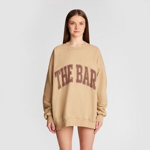 The Bar Varsity Sweatshirt brown sugar size large. Brand new in bag